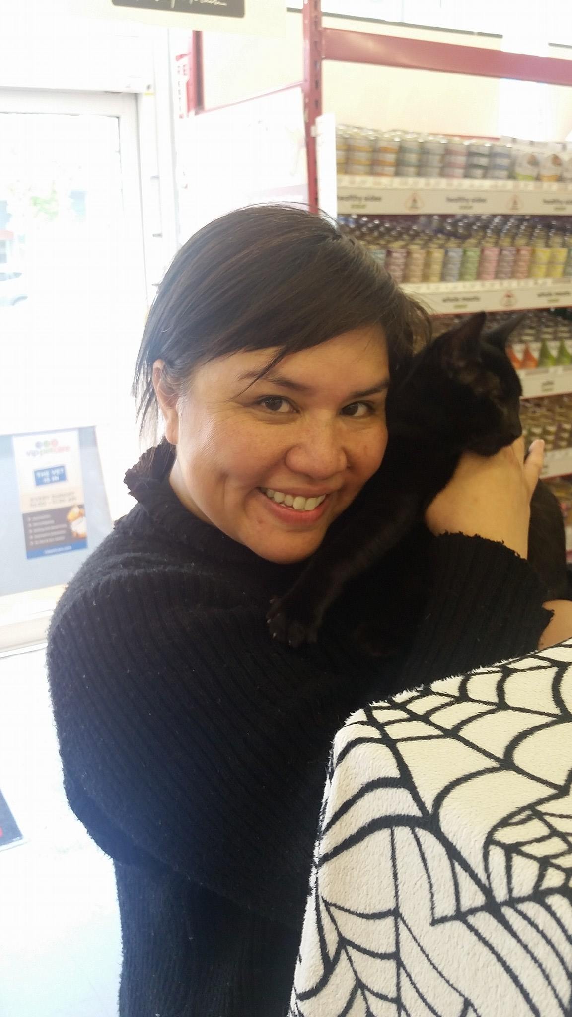 Duncan the little cuddler adopted today at Petfood Express